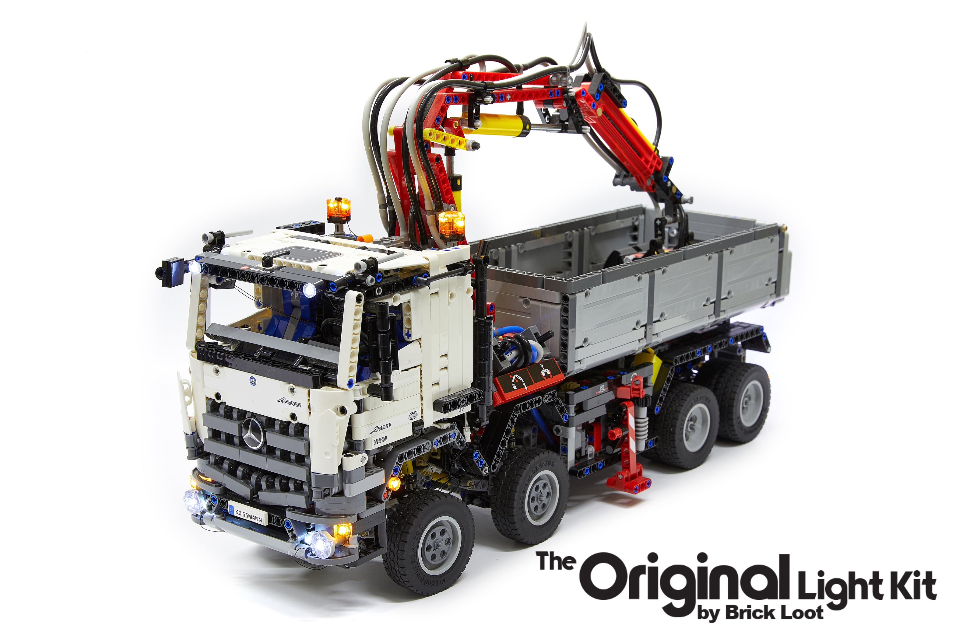 LEGO® Mercedes Benz Arocs 3245 set 42043 with the custom Brick Loot Original LED Light Kit installed.