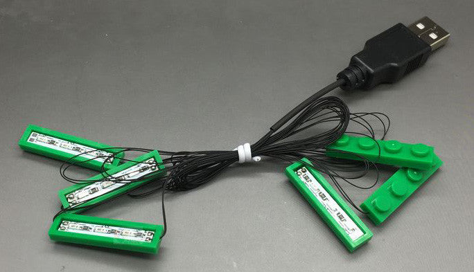 USB-powered neon green light string, manufactured by Brick Loot. Custom designed for the LEGO Monster Haunted House set 10228 by Brick Loot. These light strings can be used in other LEGO kits, too!